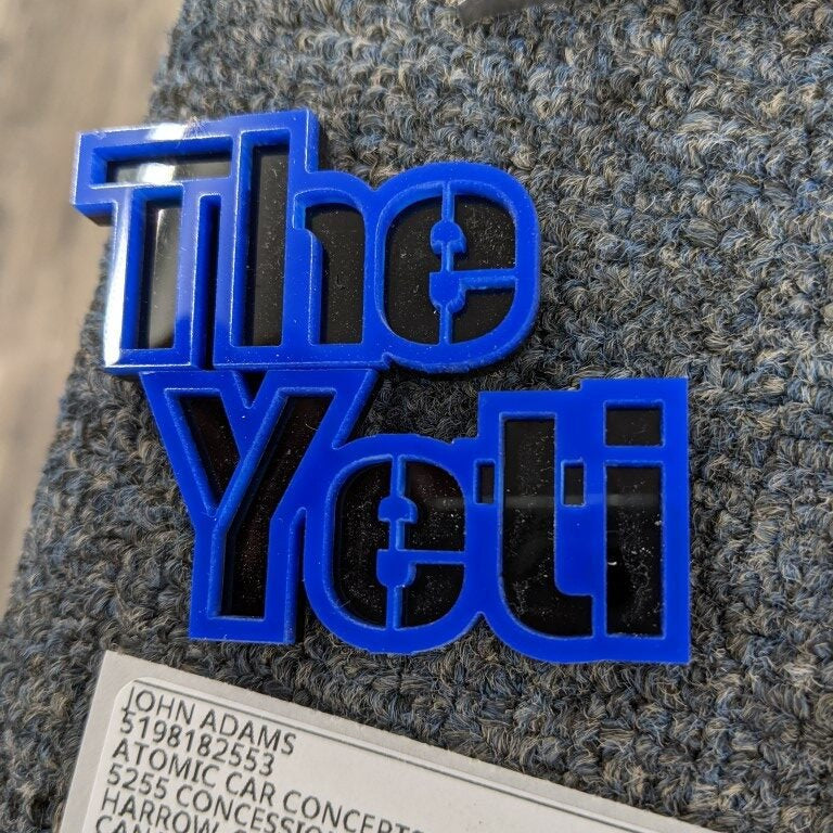 The Yeti Car Badge - Blue On Gloss Black - Stencil Font - Tape Mount - Atomic Car Concepts