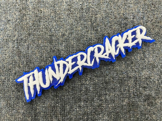 Thundercracker Car Badge - White On Blue - Aggressive Font - Atomic Car Concepts