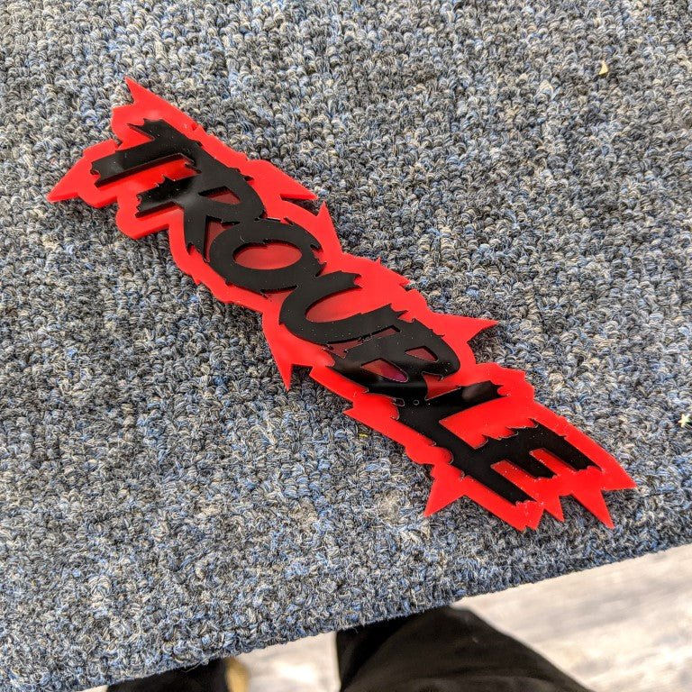 Trouble Car Badge - Gloss Black On Red - Lightning Font - Atomic Car Concepts