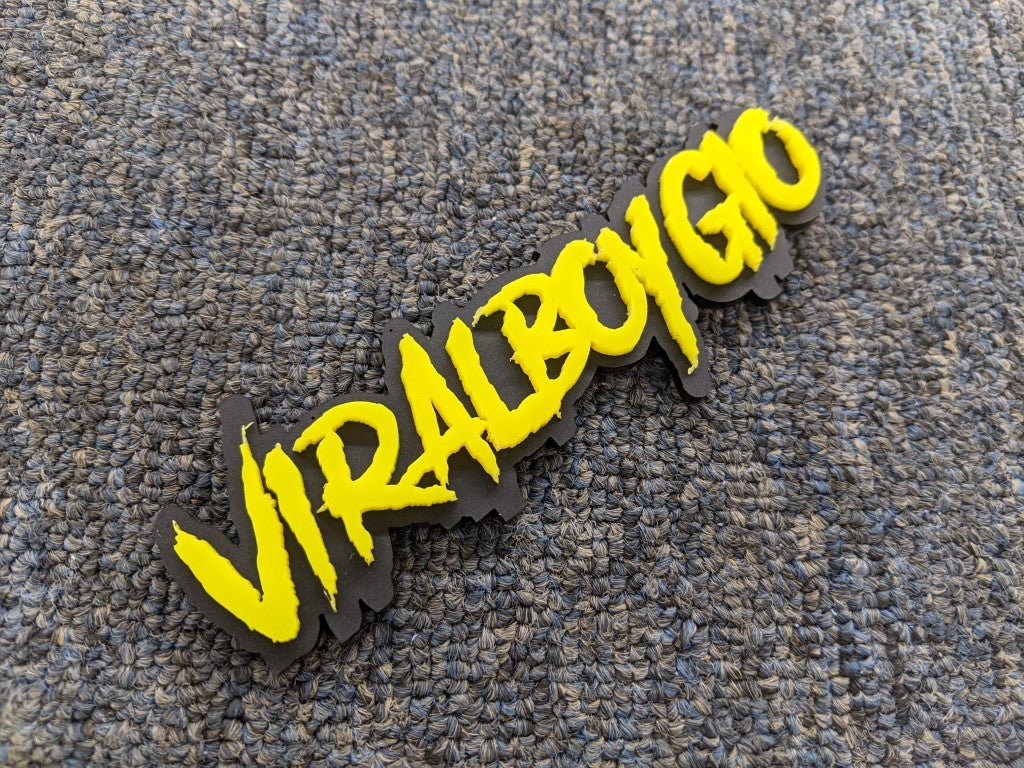 ViralboyG10 Car Badge - Yellow on Matte Black - Aggressive Font - Tape Mounting - Atomic Car Concepts