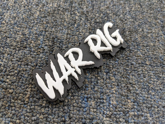 War Rig Car Badge - White on Matte Black - Aggressive Font - Tape Mounting - Atomic Car Concepts